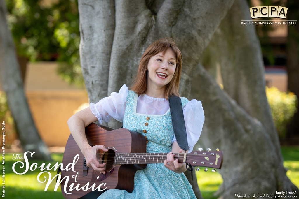 Actor Emily Trask singing with guitar in Sound of Music