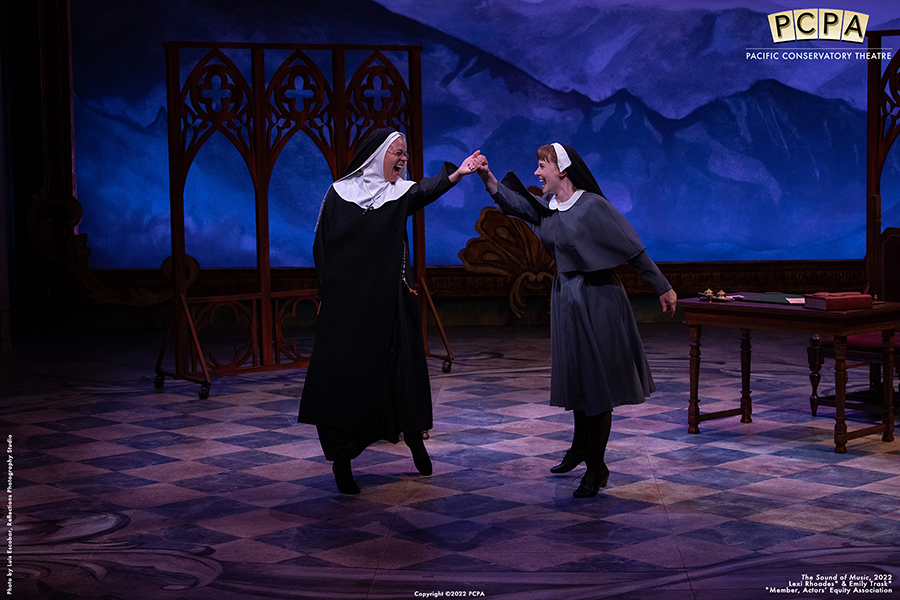 Actor playing Maria and Actor playing Mother Abbess singing onstage in Sound of Music